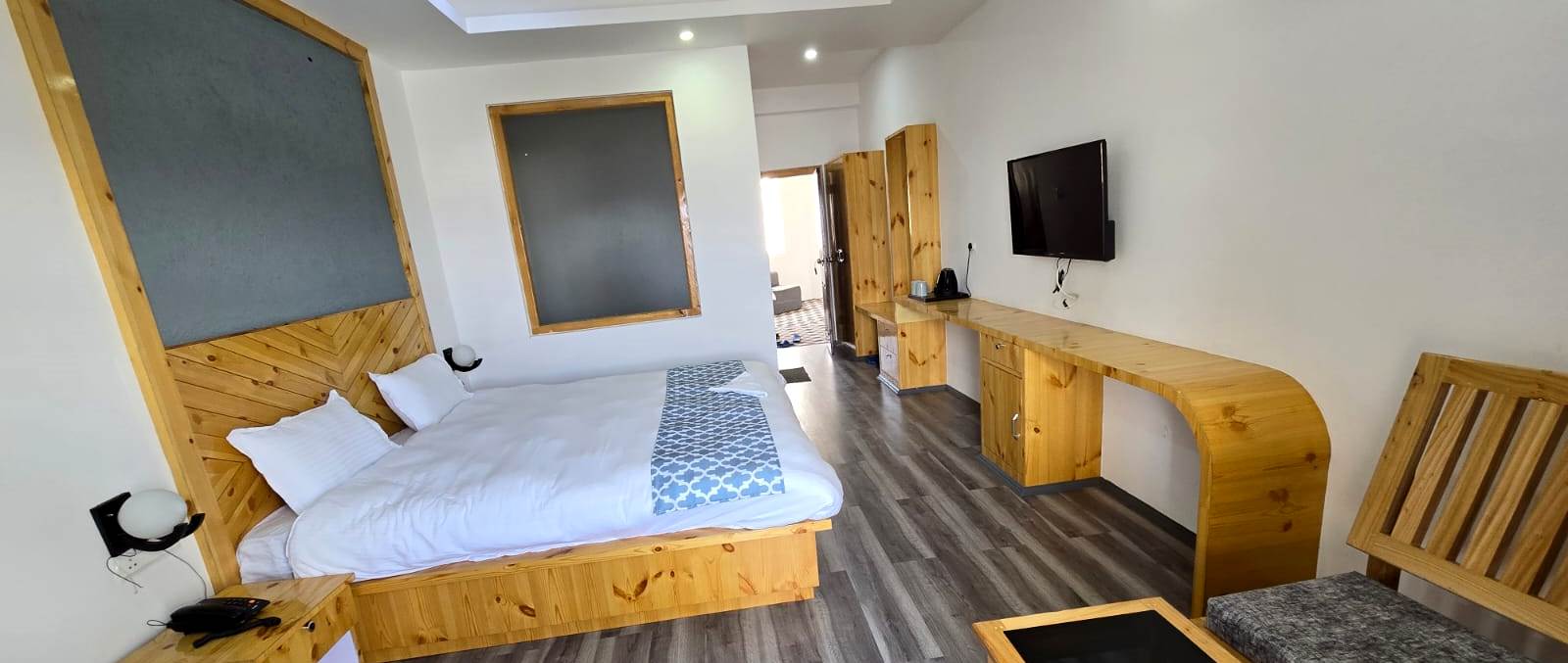 Bed in deluxe room at Villa Lion View